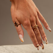 Twisted design wedding ring – elegant and plated in 18K gold