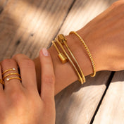 Brazalete Twist – Elegancia Bañada en Oro de 18 Quilates